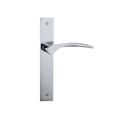 Polished chrome curved door lever on long backplate with modern minimalist design